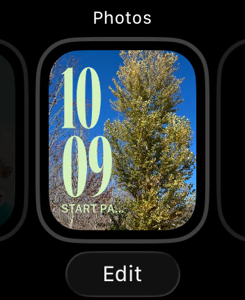 An Apple Watch face zoomed out after a long press, with an Edit button below it